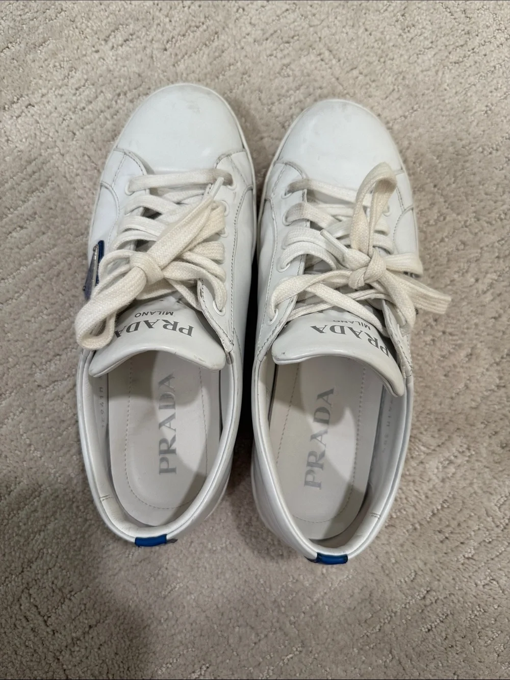 Prada White Leather Sneakers with Blue Logo Accent